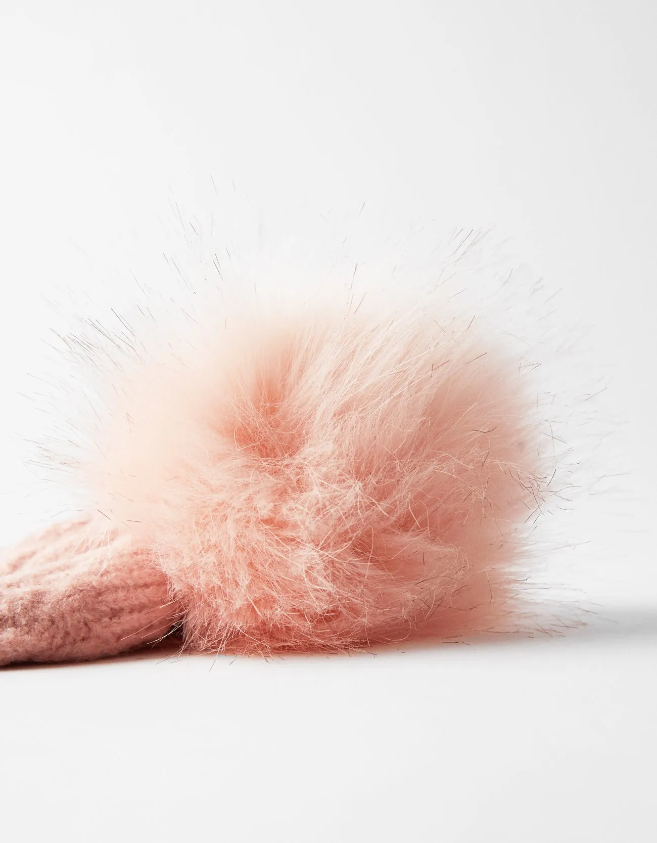 Hat with faux fur pompom