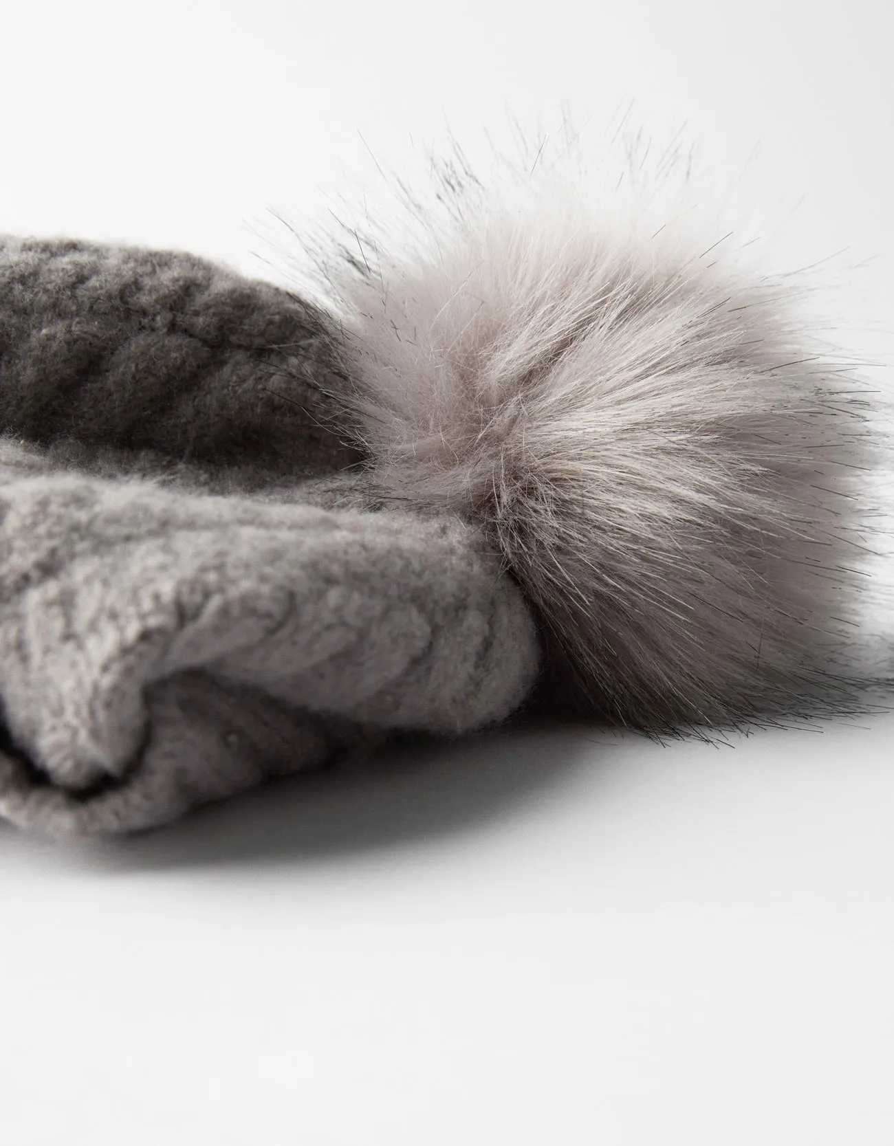 Hat with faux fur pompom