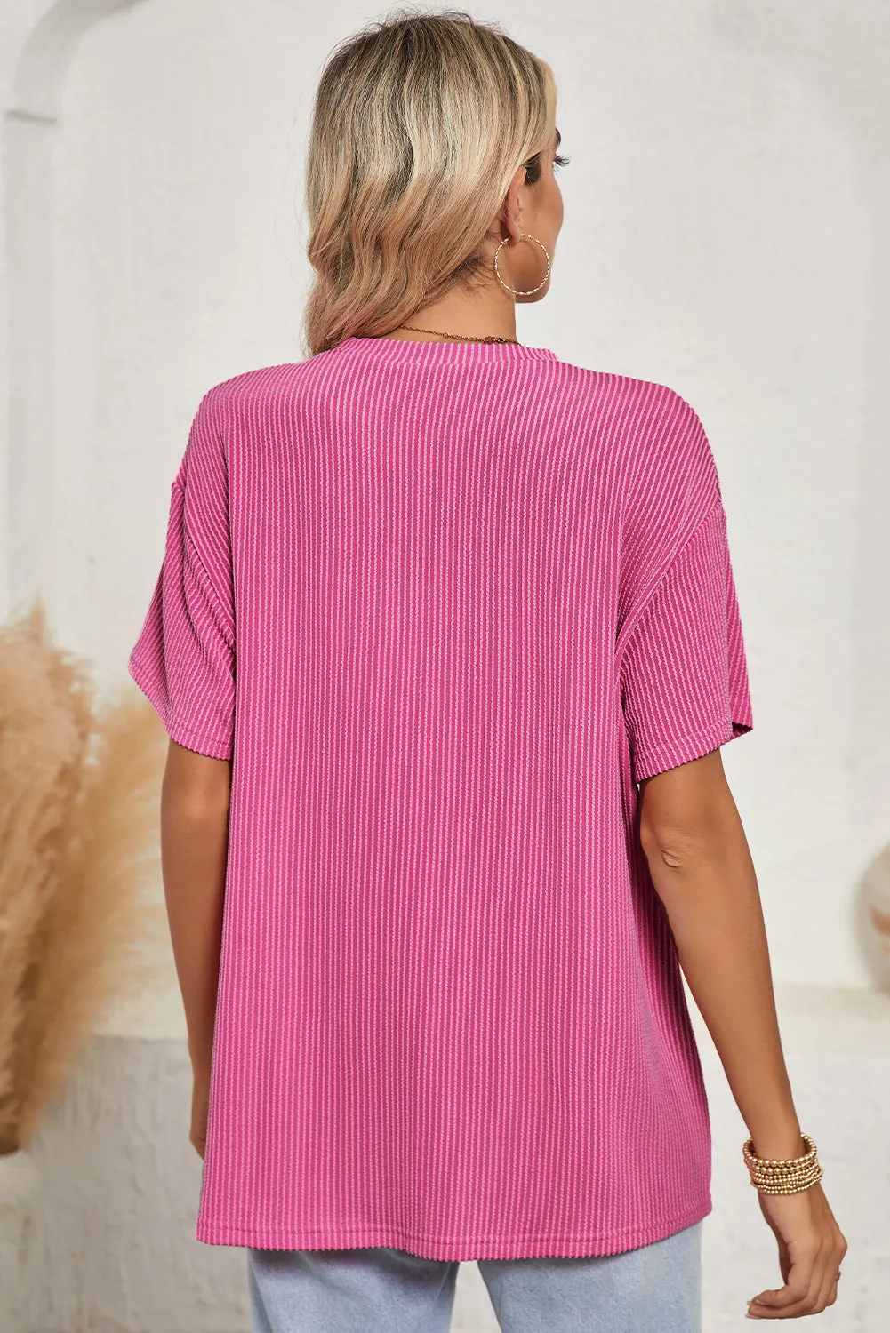 Pink Crinkle Rib Knit Pocketed Loose Fit Crew Neck T-Shirt – A Textured Take on Everyday Chic