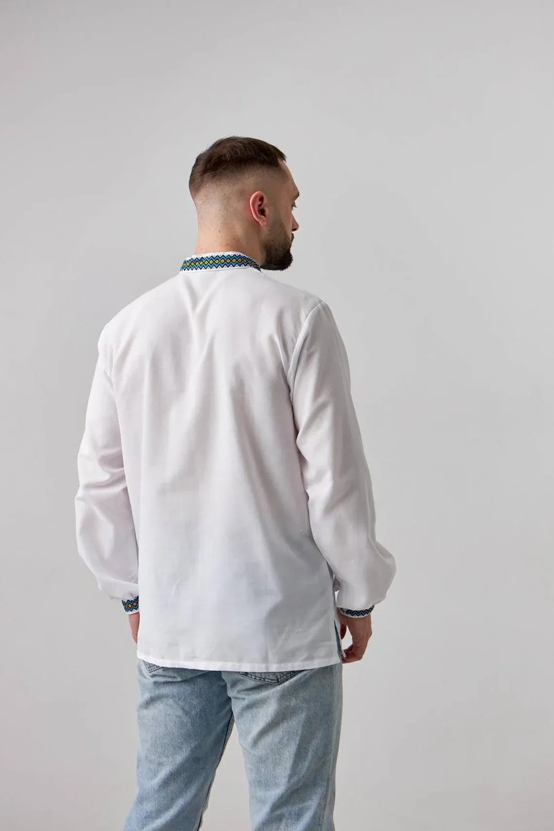 Ukrainian men's embroidered shirt of white color with woven embroidery