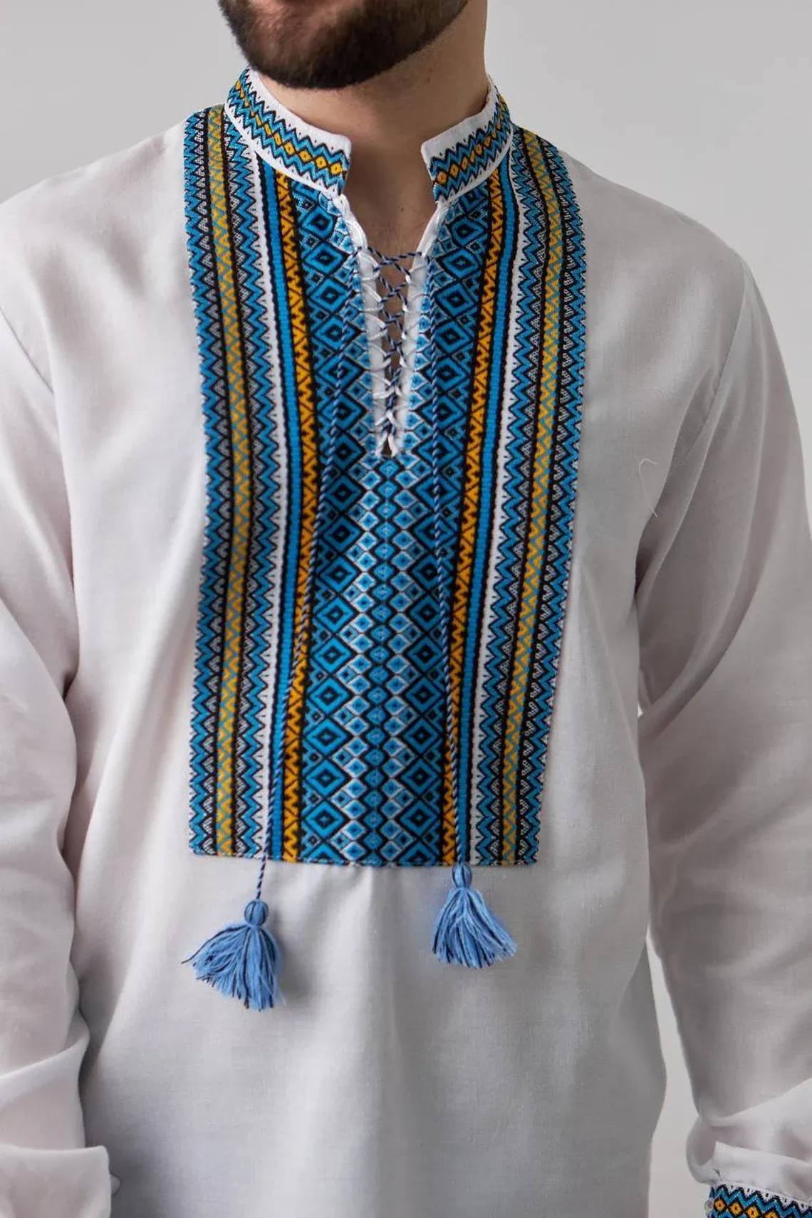 Ukrainian men's embroidered shirt of white color with woven embroidery